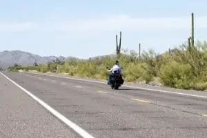 a foreigner riding a bike on US road