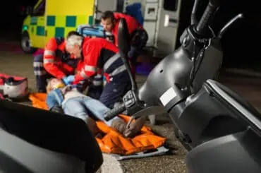 injured driver taking emergency help