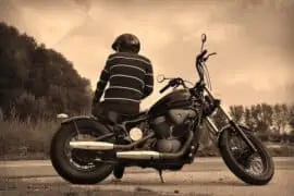 Navigating Motorcycle Insurance Options After a DUI Conviction man sitting on bike
