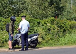 police checking moped documents