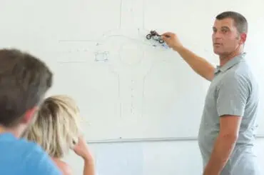 driving instructor in drawing board