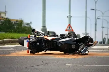 a bike is dropped on road