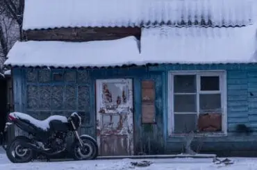 bike seat covered with ice