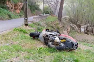 A bike falling off on the road side