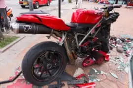 Motorcycle is Totaled: Learn What Happens Next wrecked bike on road