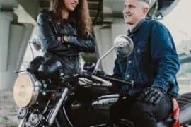 Learn How a Non-owner Policy Works for You! motorcycle owner and his friend having a chat