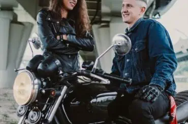 Learn How a Non-owner Policy Works for You! motorcycle owner and his friend having a chat