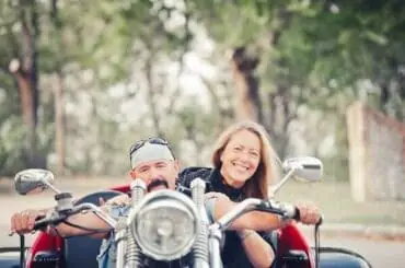 couple riding a trike