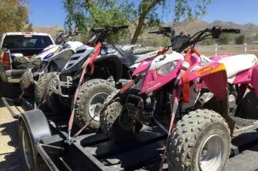 Do I Need Motorcycle Trailer Insurance? A trailer carrying multiple ATVs