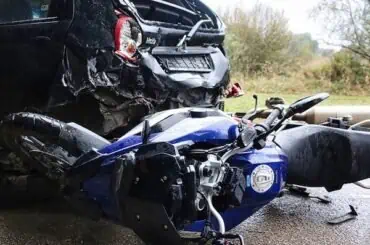 How to Buy Back a Totaled Motorcycle from Your Insurance Company? motorcycle and car crash in road