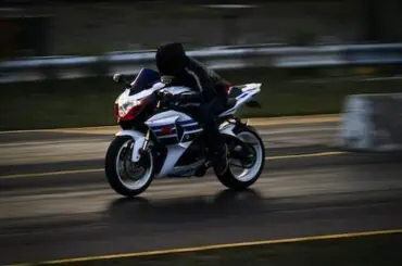 How Does ABS Work for Motorcycles? What You Should Know! high speed bike on road