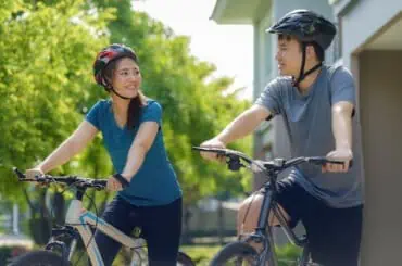 Can You Ride Dirt Bikes in the Neighborhood? couple preparing for a bike ride
