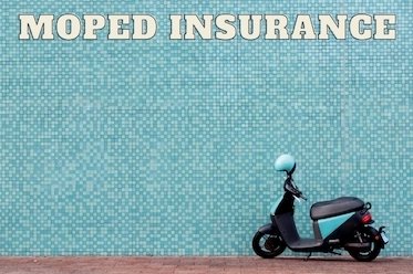 moped stands against a wallk