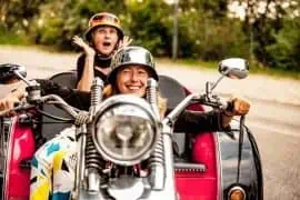 What Does Autocycle Insurance Cover? woman riding a trike