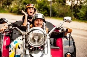 What Does Autocycle Insurance Cover? woman riding a trike