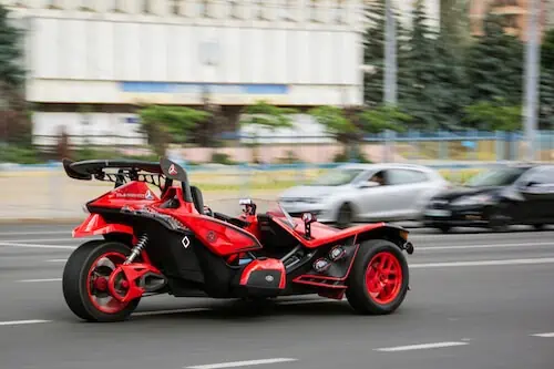 Unique slingshot going fast on the road