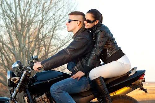 young couple going for a motorcycle ride