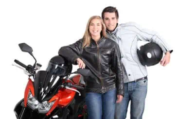 Discover the Top Motorcycles for Riding with Passengers biker couple posing for picture