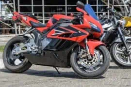 Comparing the Cost and Convenience of Insuring Multiple Bikes on One Policy Vs. Separate Policies Motorcycles parked side by side