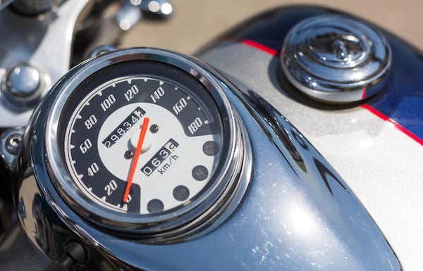 Take a picture of motorcycle speedometer and send to Voom every month